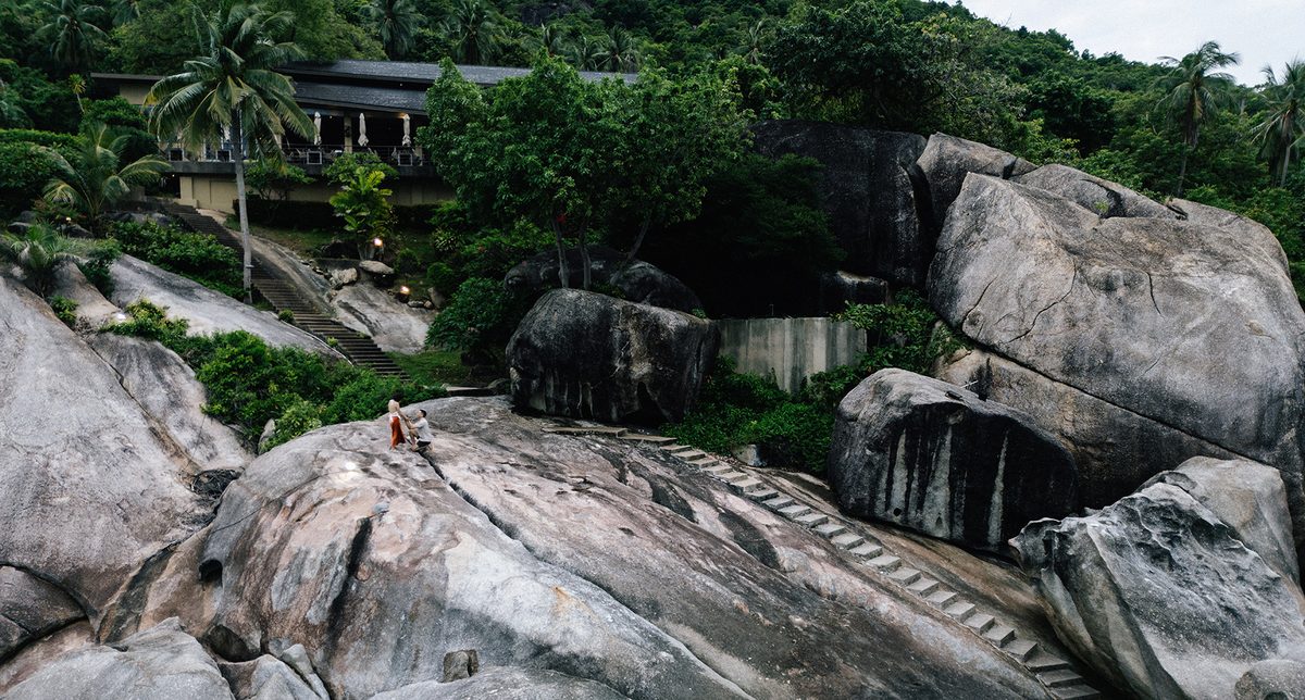 Marriage proposal on a huge rock overlooking the sea in Koh Samui