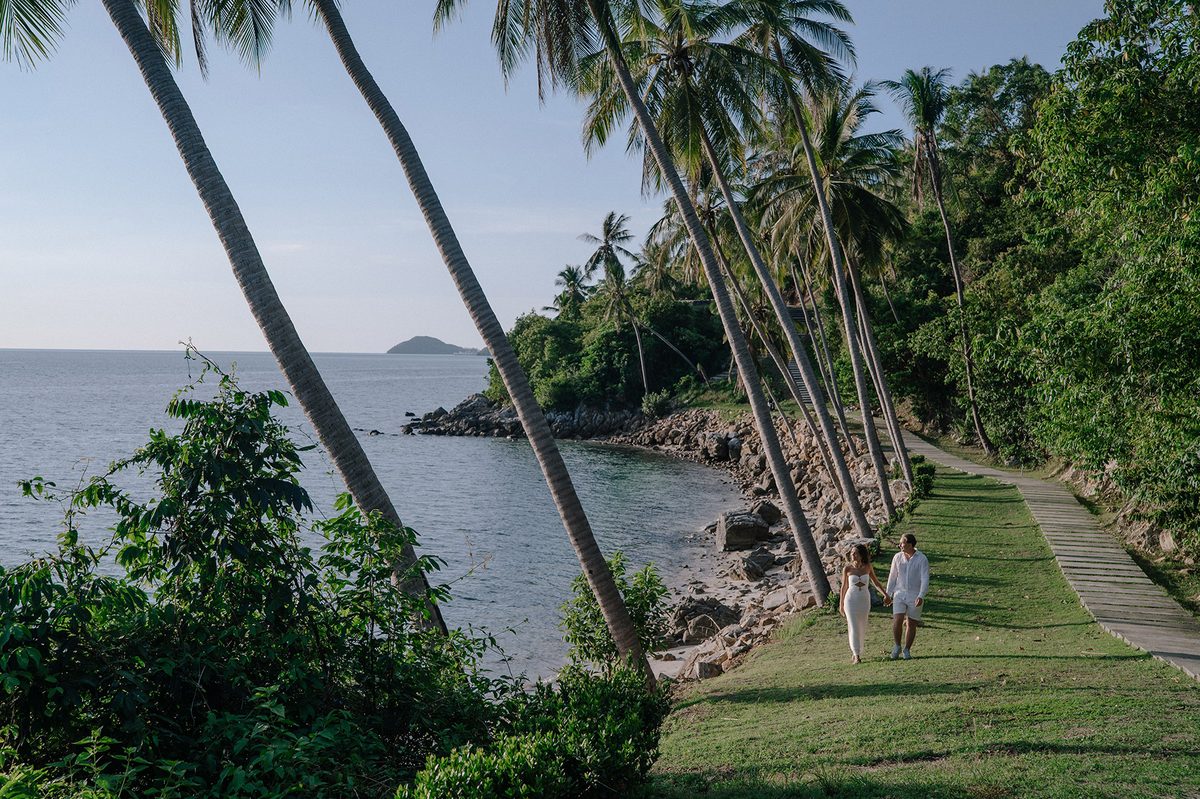 Marriage proposal in a palm grove by the sea in Koh Samui